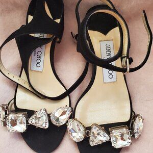 Black suede sandals by Jimmy Choo